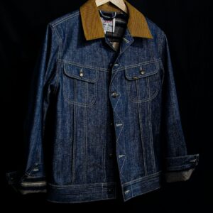 A blue denim button-through jacket