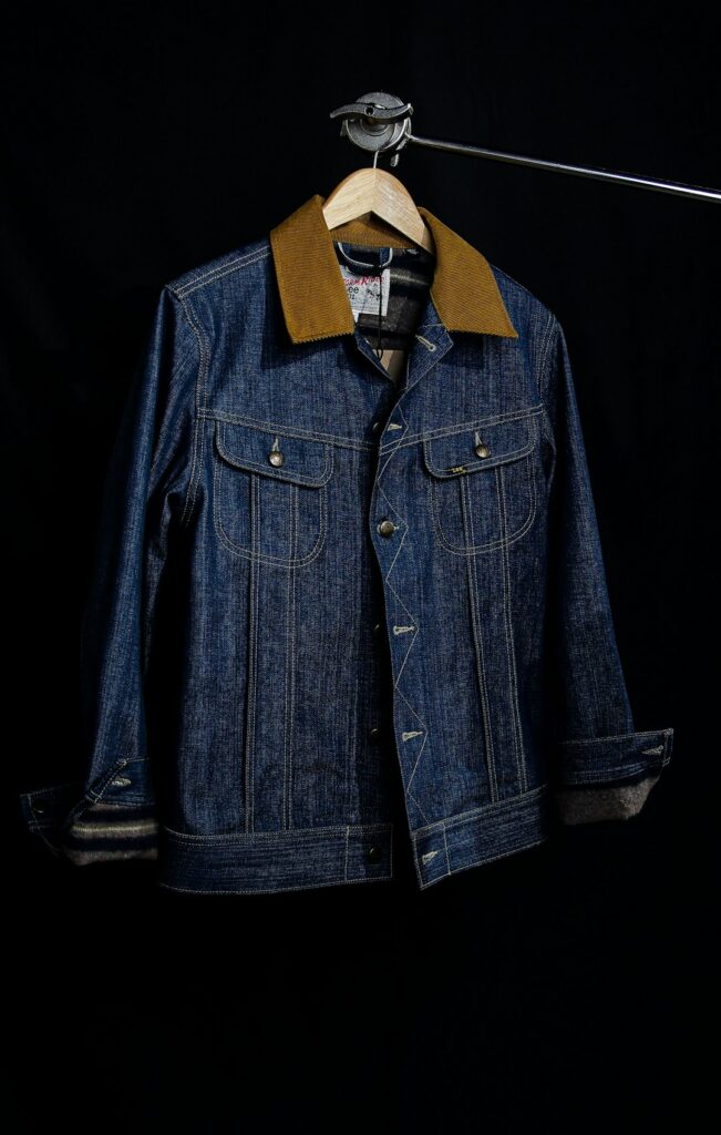 A blue denim button-through jacket